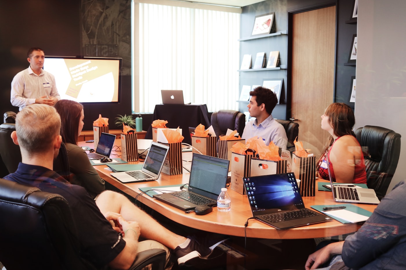 Team reviewing a design, a sign it may be time for a website redesign
